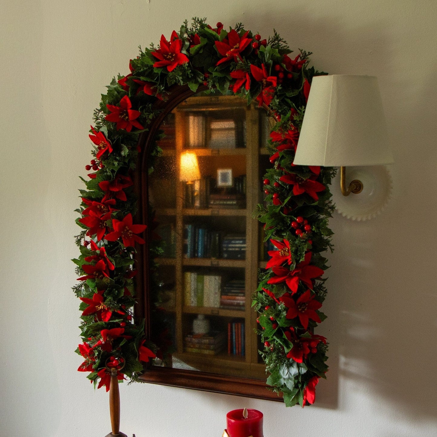 6’ poinsettia & berry garland by Nearly Natural, UV resistant with red blooms around mirror on Tampa Home & Garden Store
