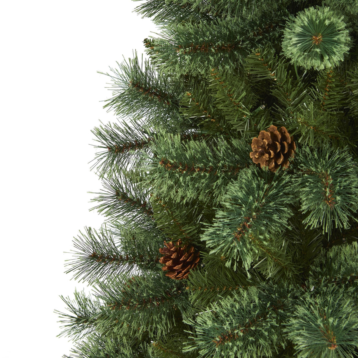 Christmas tree branch close-up from Nearly Natural with green needles and pine cone on Tampa Home & Garden Store