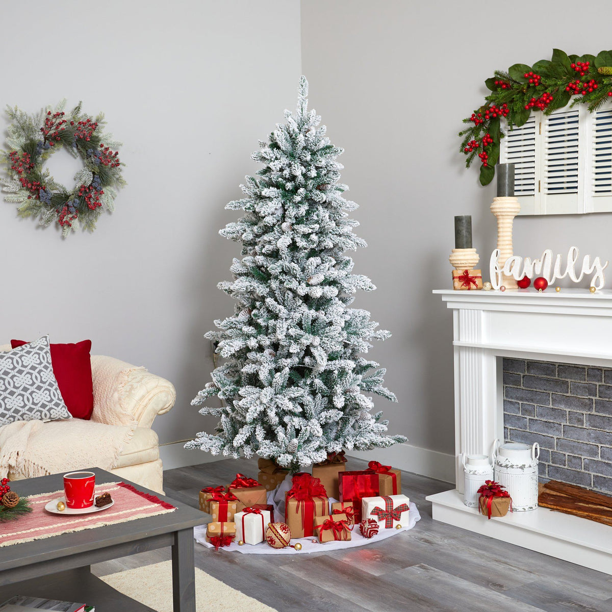 Nearly Natural flocked Livingston 6.5 ft Christmas tree with pine cones and 300 warm LED lights on Tampa Home & Garden Store