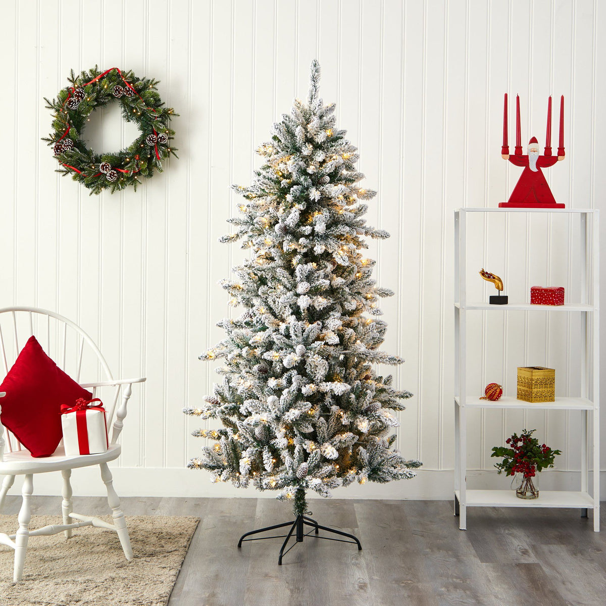 6.5 ft flocked Livingston Fir Christmas tree with pine cones and 300 clear warm LED lights Nearly Natural on Tampa Home & Garden Store