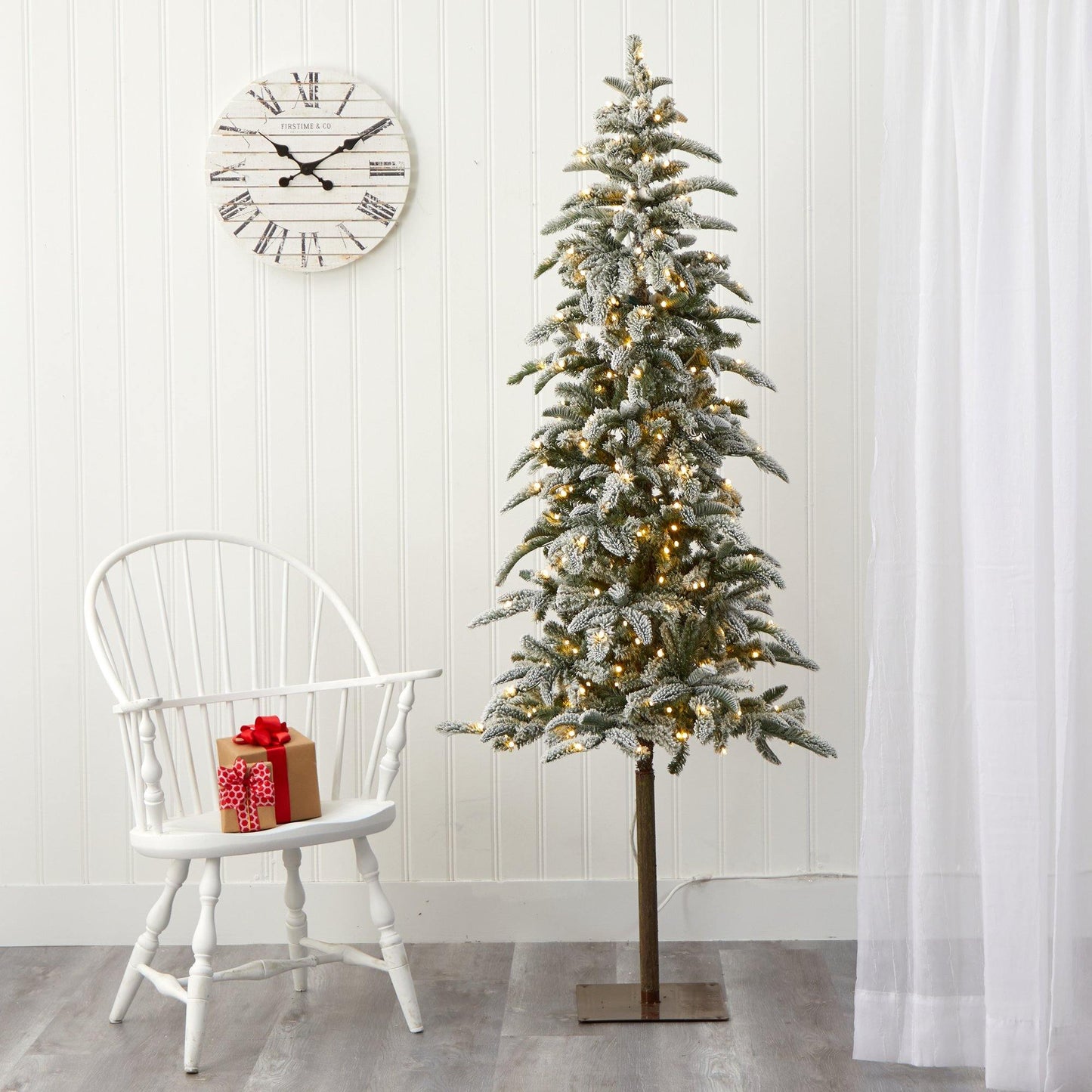 6.5' flocked Washington Alpine Christmas tree with 250 warm LED lights and 637 bendable branches on Tampa Home & Garden Store
