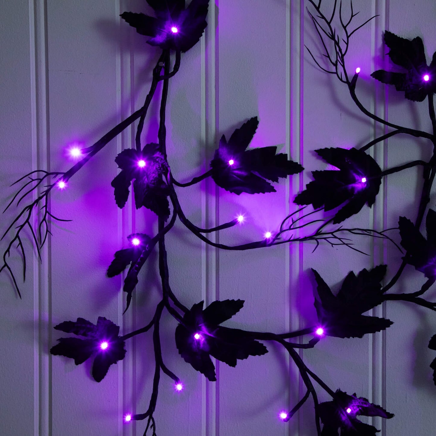 Nearly Natural 6.5' black maple Halloween garland with 48 orange and purple LED lights on Tampa Home & Garden Store