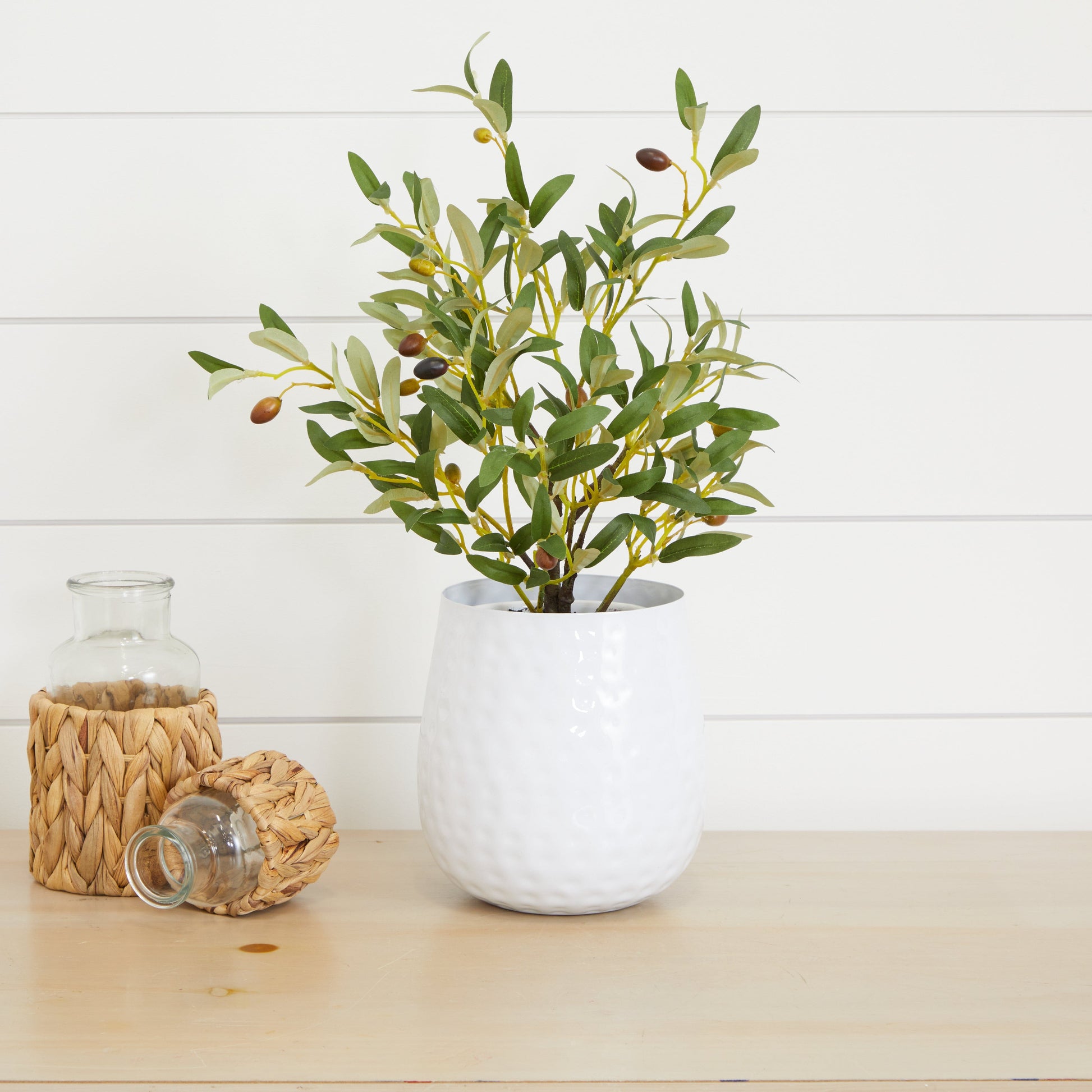 6.5” oval iron planter vase with Nearly Natural olive branch arrangement in a white textured pot on Tampa Home & Garden Store