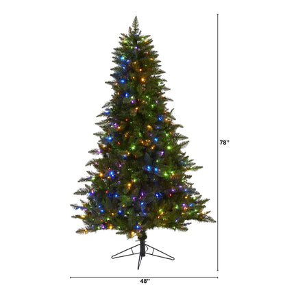 Nearly Natural 6.5 ft Vermont Spruce artificial Christmas tree with multicolor lights on a stand on Tampa Home & Garden Store