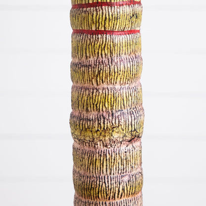 7’ Artificial Coconut Palm Tree trunk close-up with textured bark and red bands on Tampa Home & Garden Store