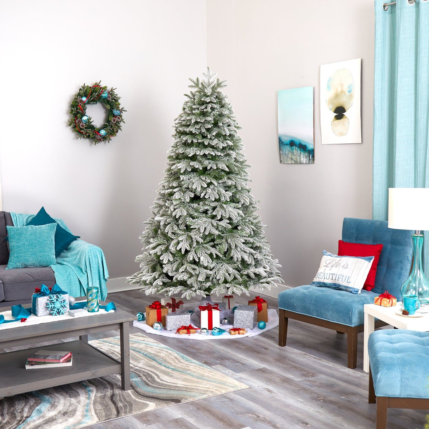 7' flocked Colorado Mountain Fir artificial Christmas tree with snowy tips in living room on Tampa Home & Garden Store