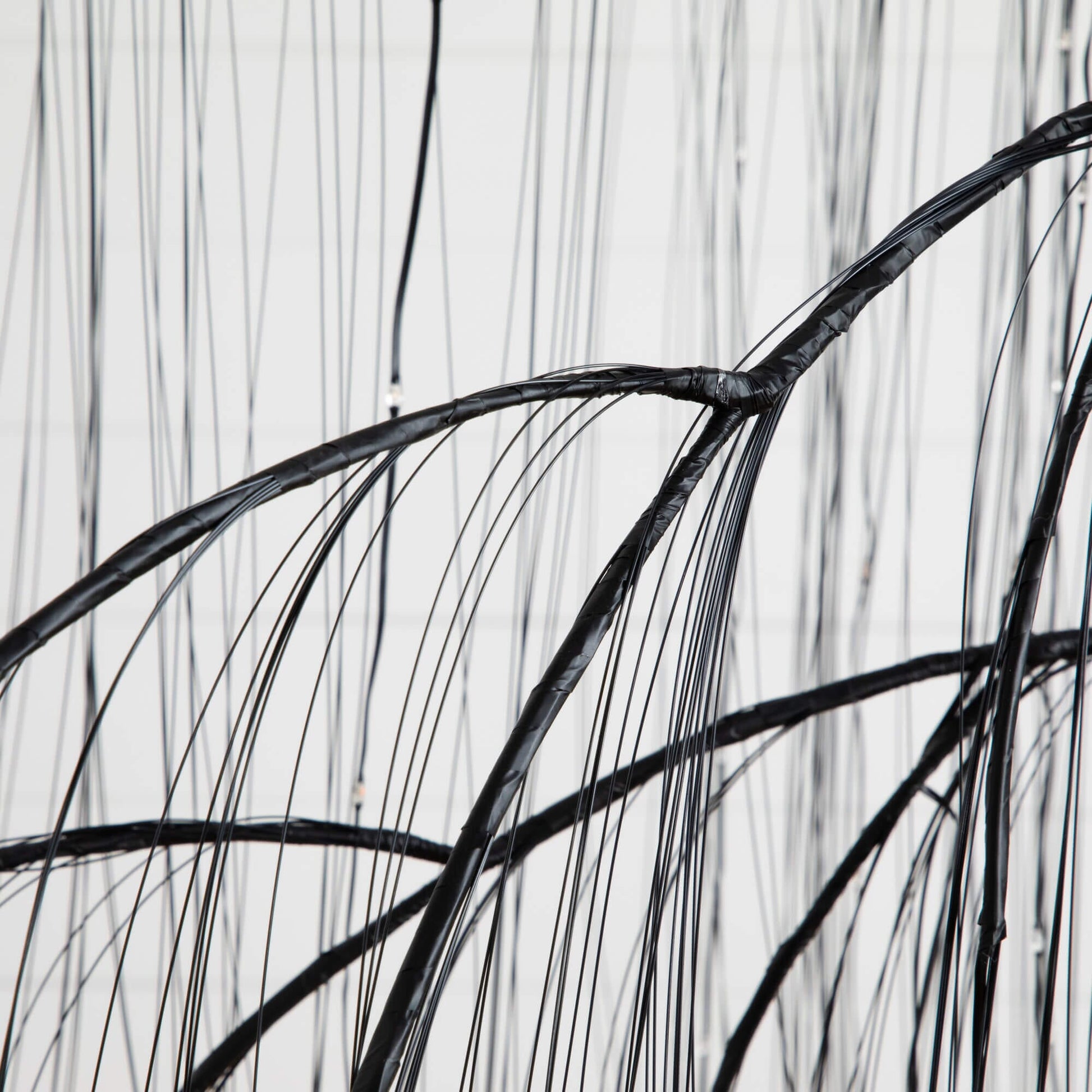 7' Pre-Lit Artificial Halloween Black Willow Tree wiring close-up with wrapped cables Nearly Natural on Tampa Home & Garden Store
