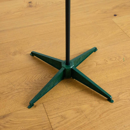 Nearly Natural Christmas tree stand with black central pole and green cross base on Tampa Home & Garden Store