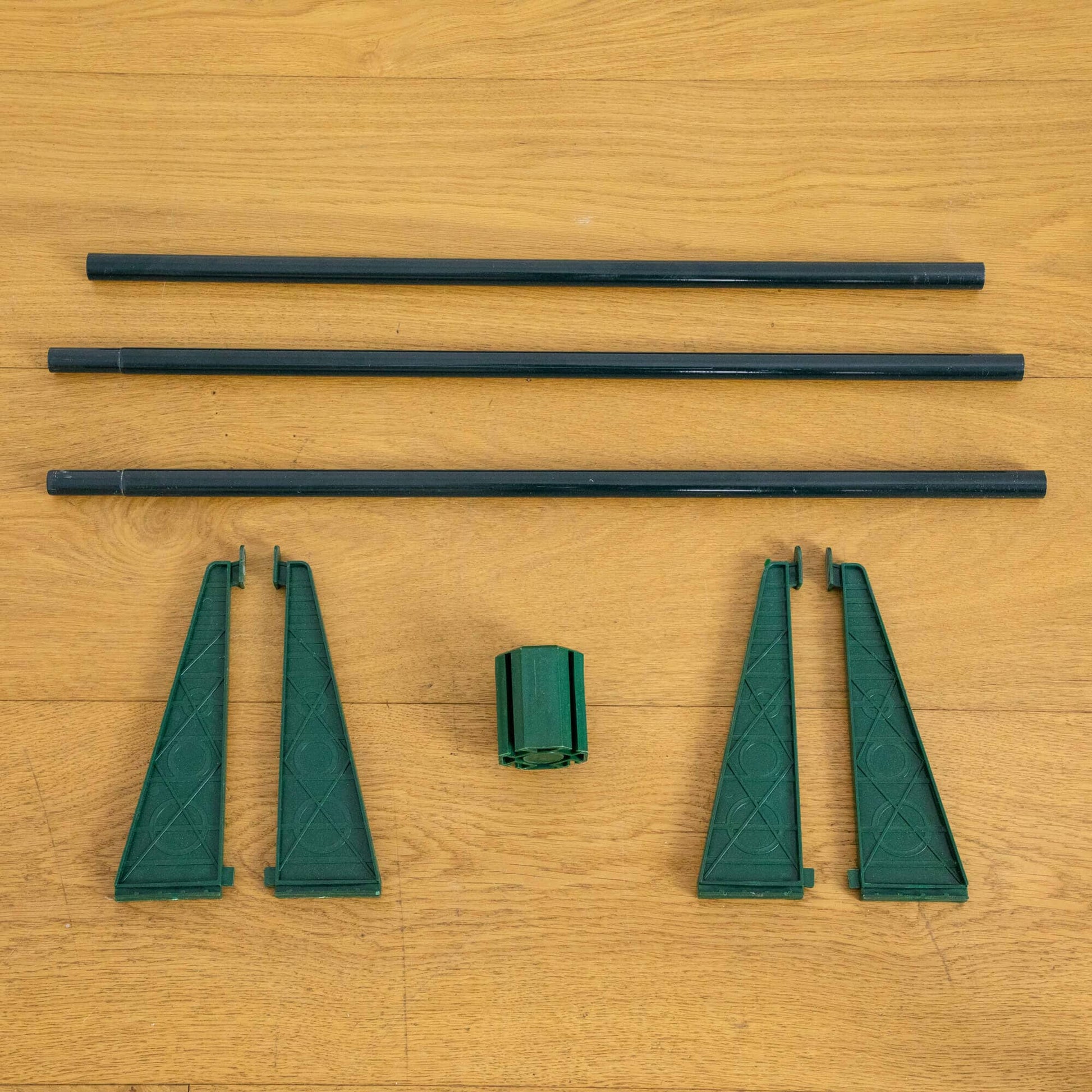 Nearly Natural green trunk sections with black extension poles for a 7' pre-lit pop-up tree on Tampa Home & Garden Store