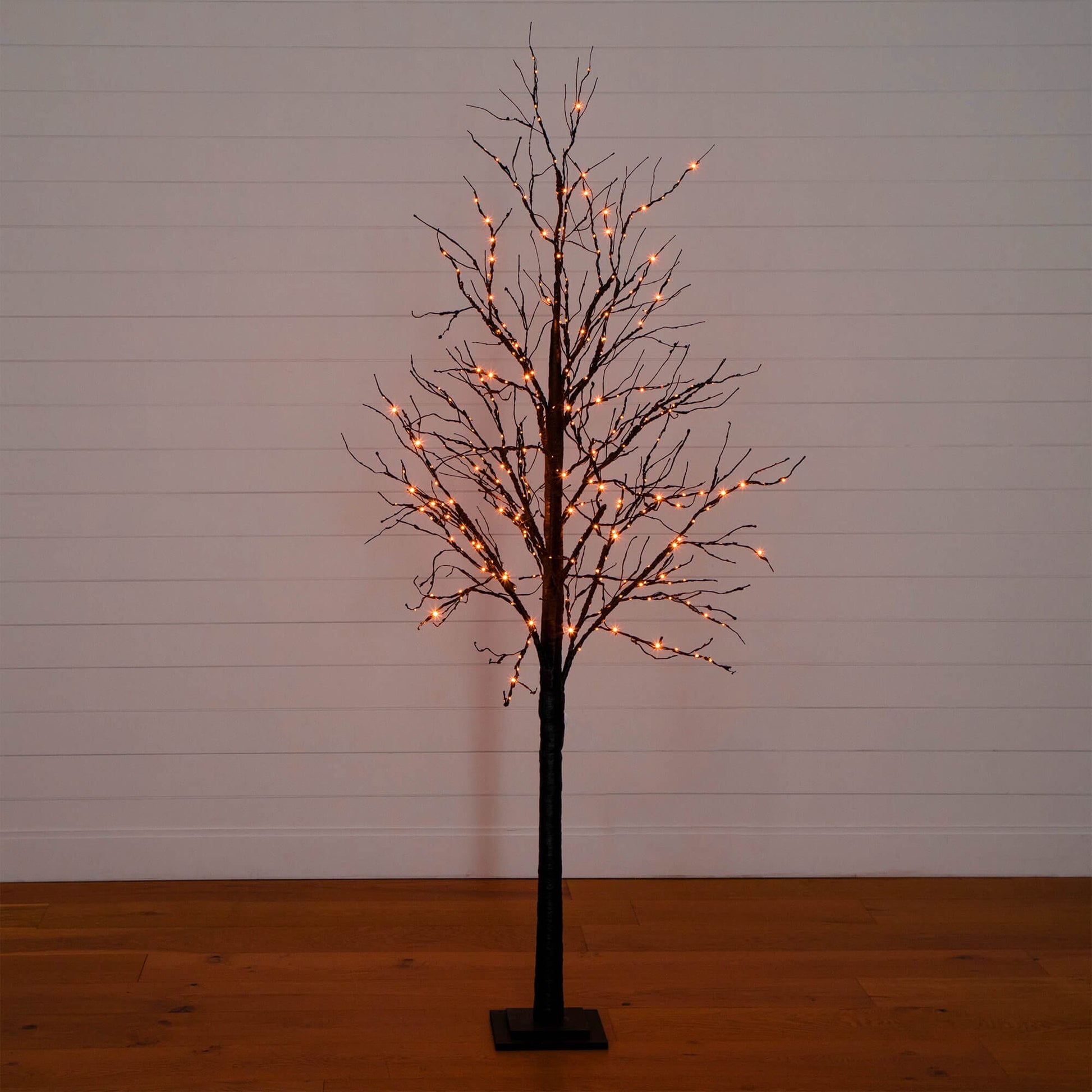 7 ft Halloween Black Twig pre-lit tree with orange LED lights on Tampa Home & Garden Store