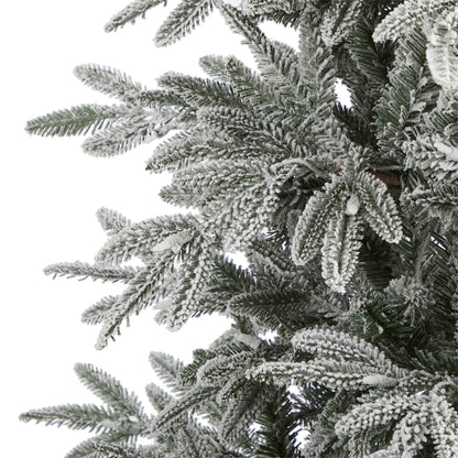 Flocked Manchester Spruce artificial Christmas tree branches with snow on green needles on Tampa Home & Garden Store
