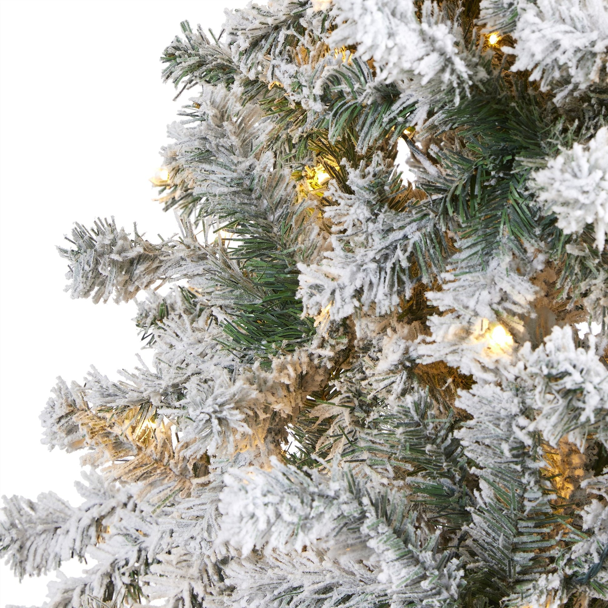 8 ft flocked Rock Springs Spruce artificial Christmas tree with 500 clear LED lights on Tampa Home & Garden Store