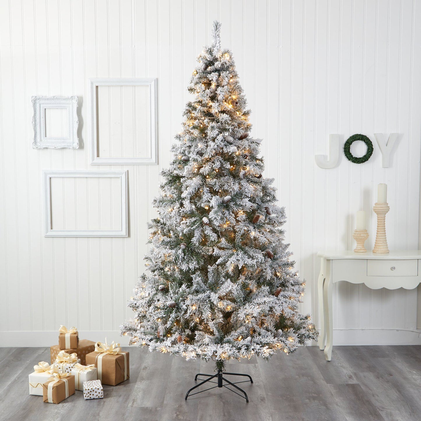 Christmas tree 8' flocked white River Mountain Pine pinecones and 500 clear LED lights on Tampa Home & Garden Store