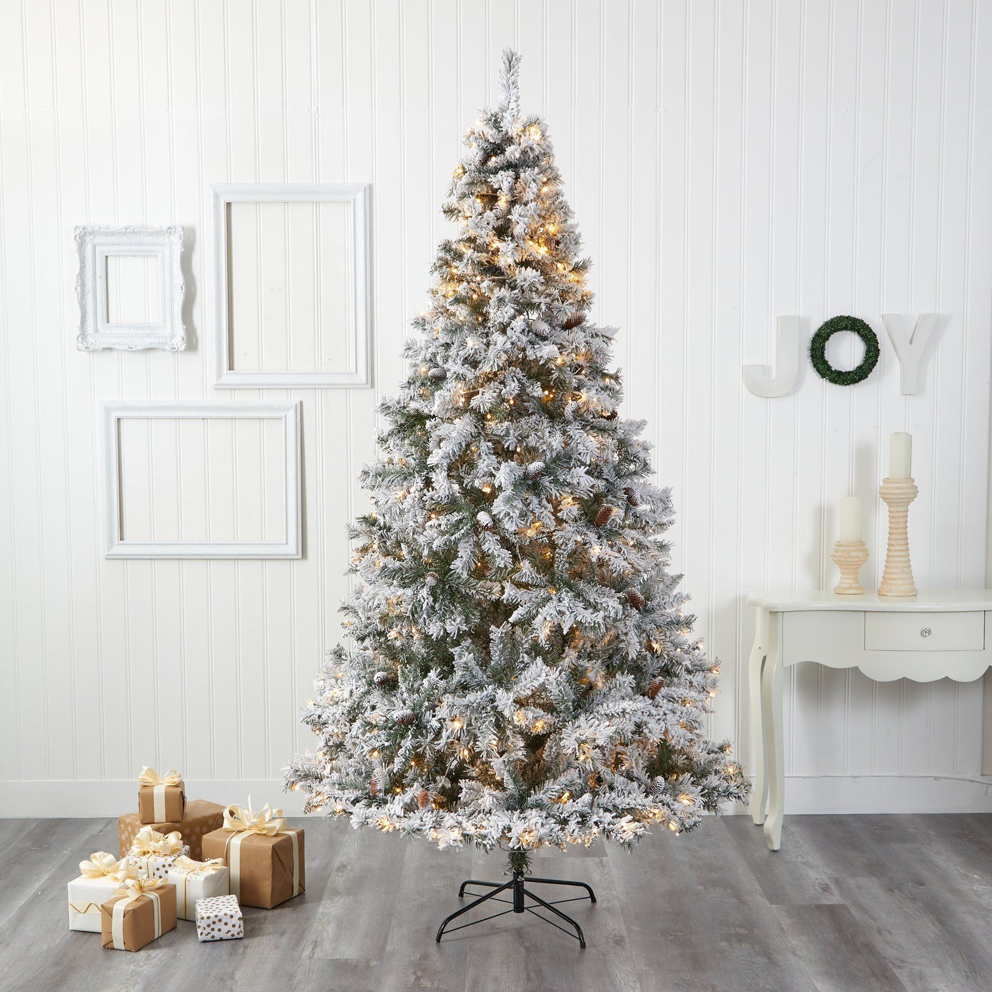 Christmas tree 8' flocked white River Mountain Pine pinecones and 500 clear LED lights on Tampa Home & Garden Store