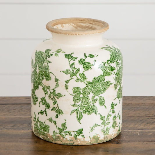 8-inch ceramic vase with green botanical scroll pattern on white ceramic body and a distressed tan rim on Tampa Home & Garden Store