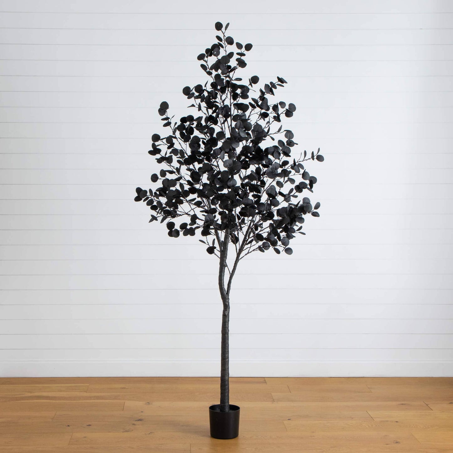 8' Pre-Lit Halloween Black Eucalyptus Tree with 540 orange and purple LEDs in a black pot on Tampa Home & Garden Store