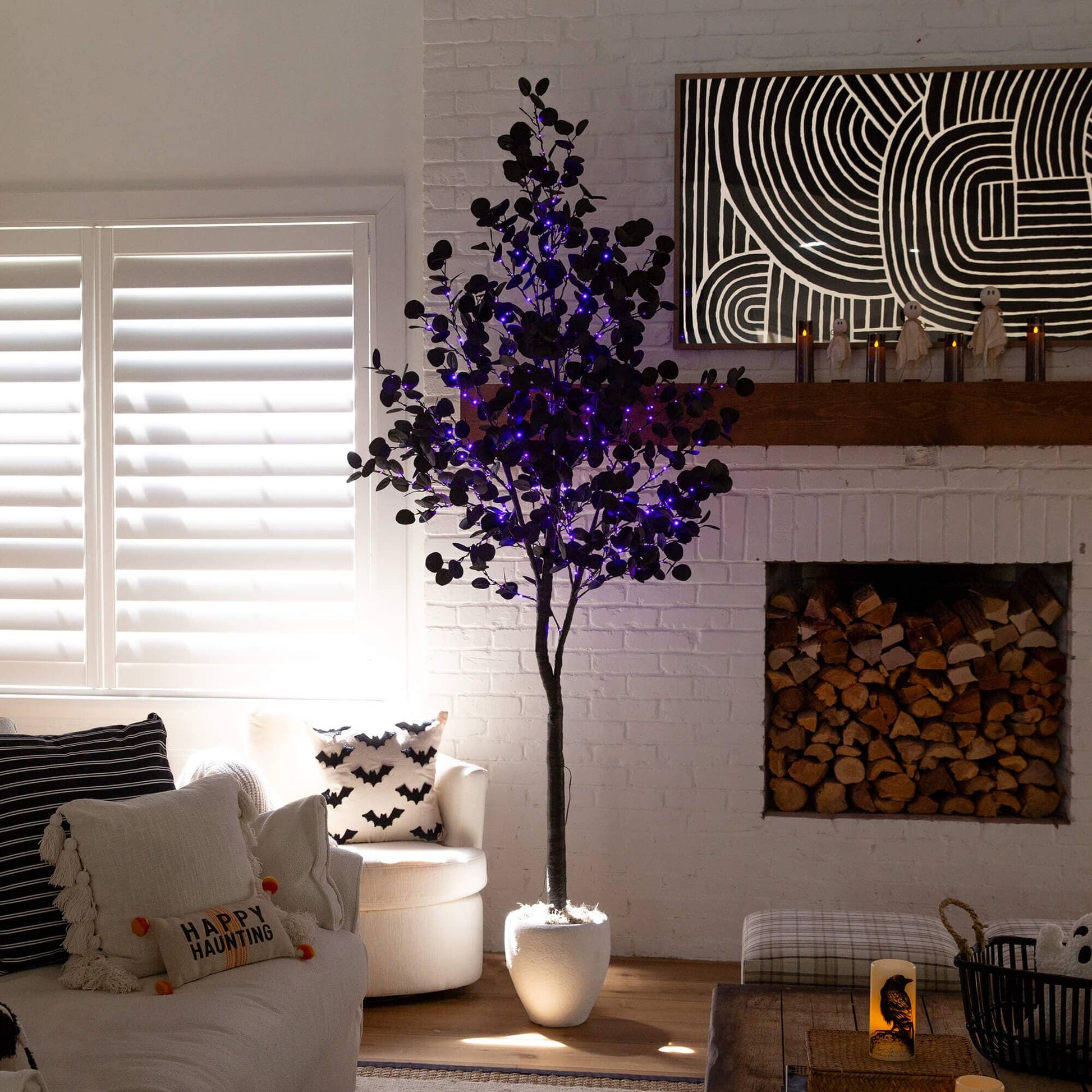 8 ft tall pre-lit artificial Halloween black eucalyptus tree with purple & orange LEDs on Tampa Home & Garden Store