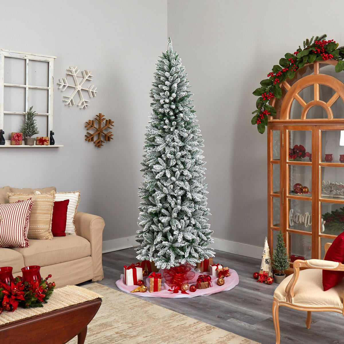 8 ft Slim Flocked Montreal Fir artificial Christmas tree by Nearly Natural in a living room on Tampa Home & Garden Store