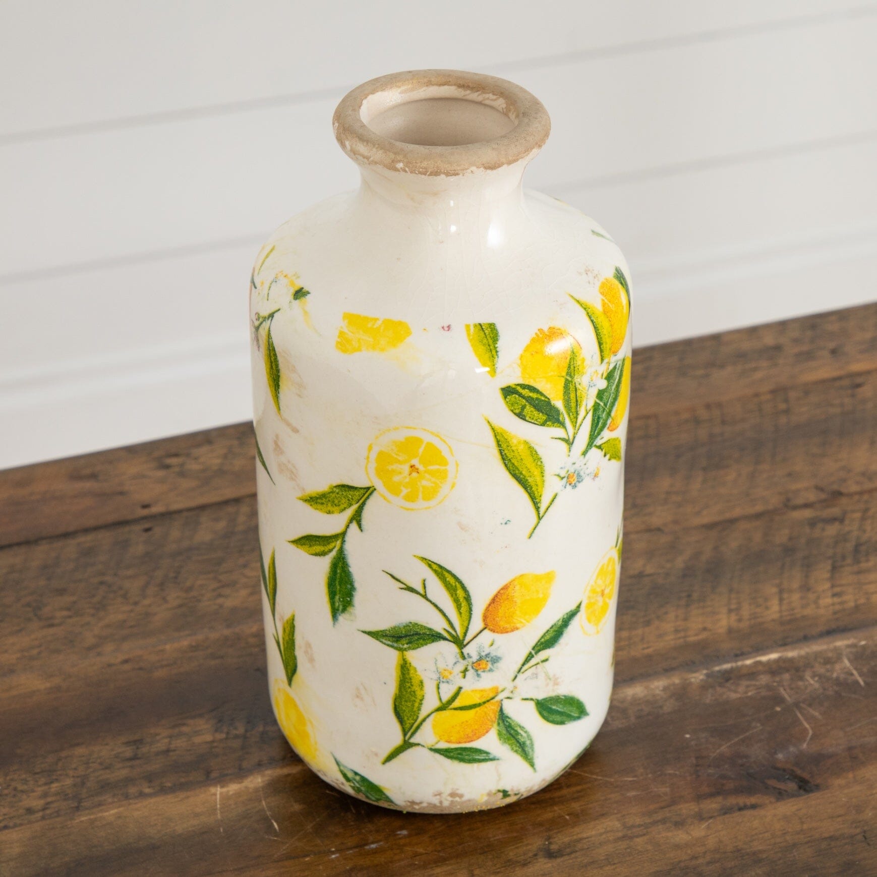 8.5-inch lemon print ceramic vase with green leaves in rustic white glaze on Tampa Home & Garden Store