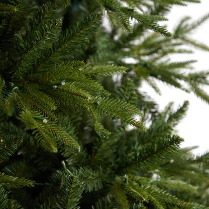 Nearly Natural 9 ft Colorado Mountain Fir Natural Look tree closeup with dense needles and 900 multi LED lights on Tampa Home & Garden Store