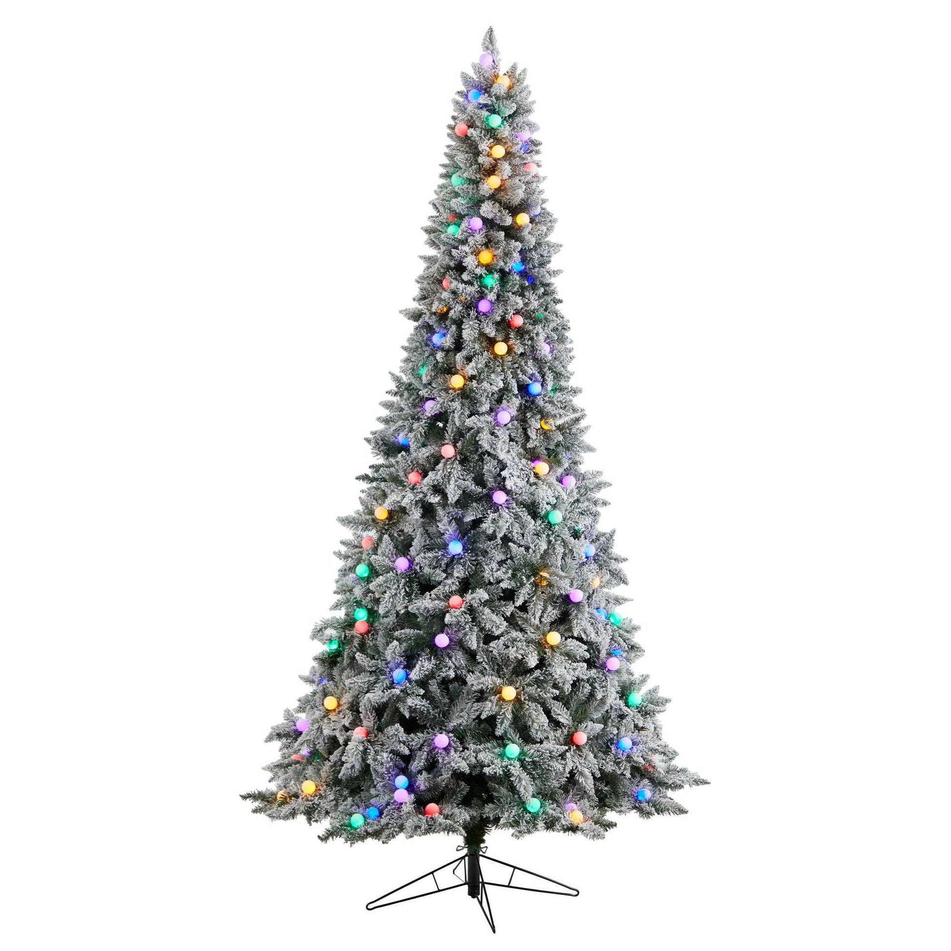 9.5' Flocked BC Mountain Fir Christmas tree by Nearly Natural with colored lights on metal stand on Tampa Home & Garden Store