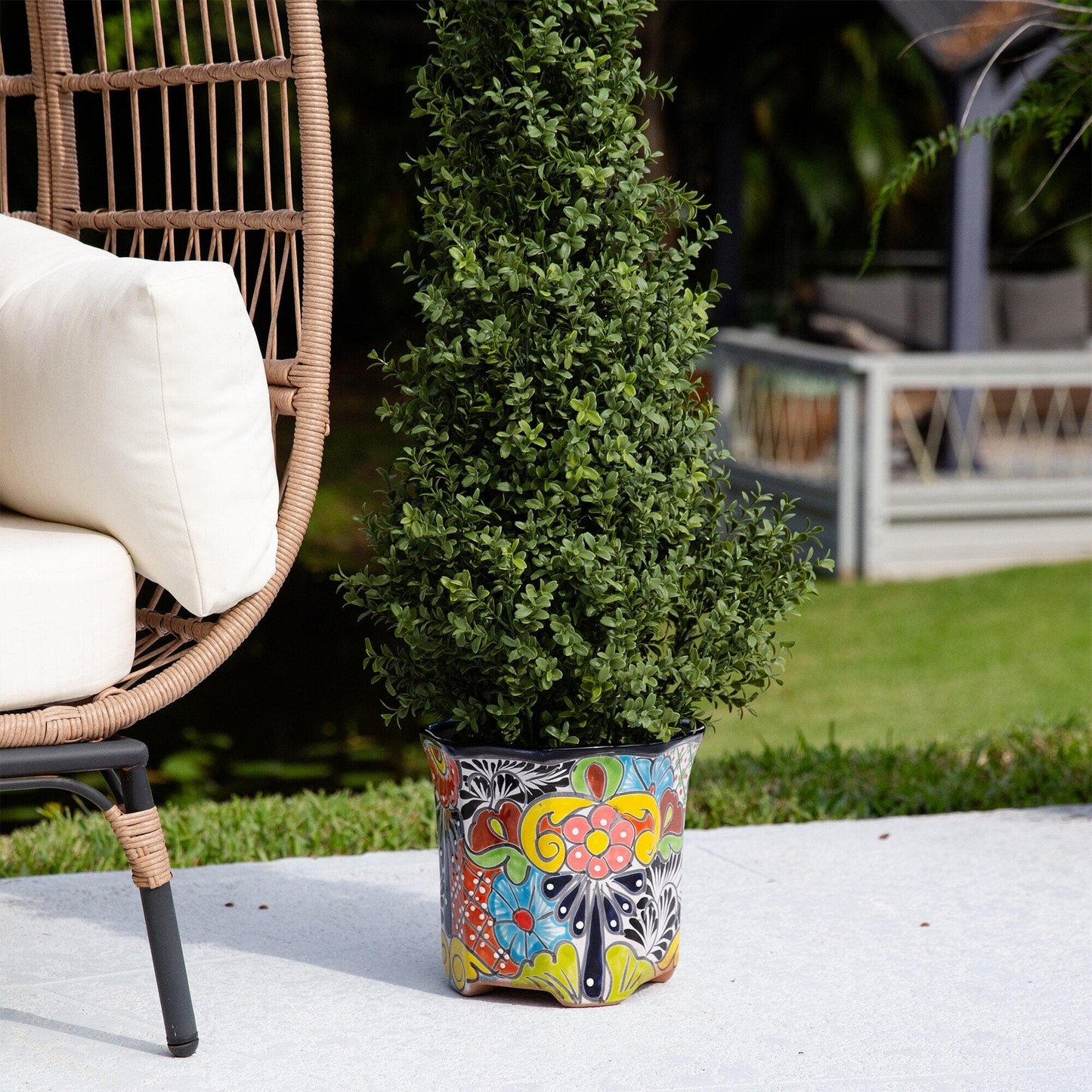 Planter 9.5x10 Handmade Talavera ceramic with vibrant pattern holding a green shrub on Tampa Home & Garden Store