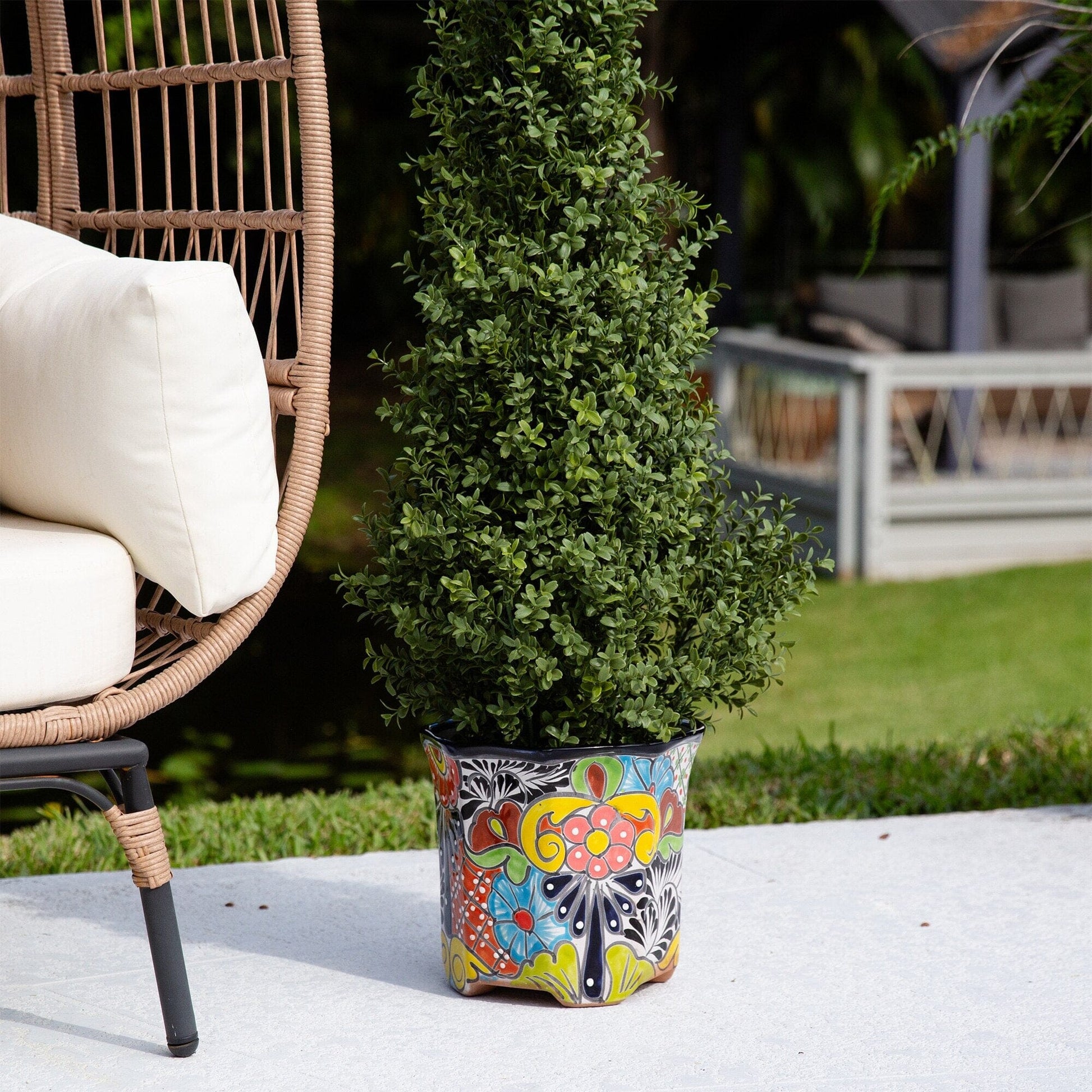 Planter 9.5x10 Handmade Talavera ceramic with vibrant pattern holding a green shrub on Tampa Home & Garden Store