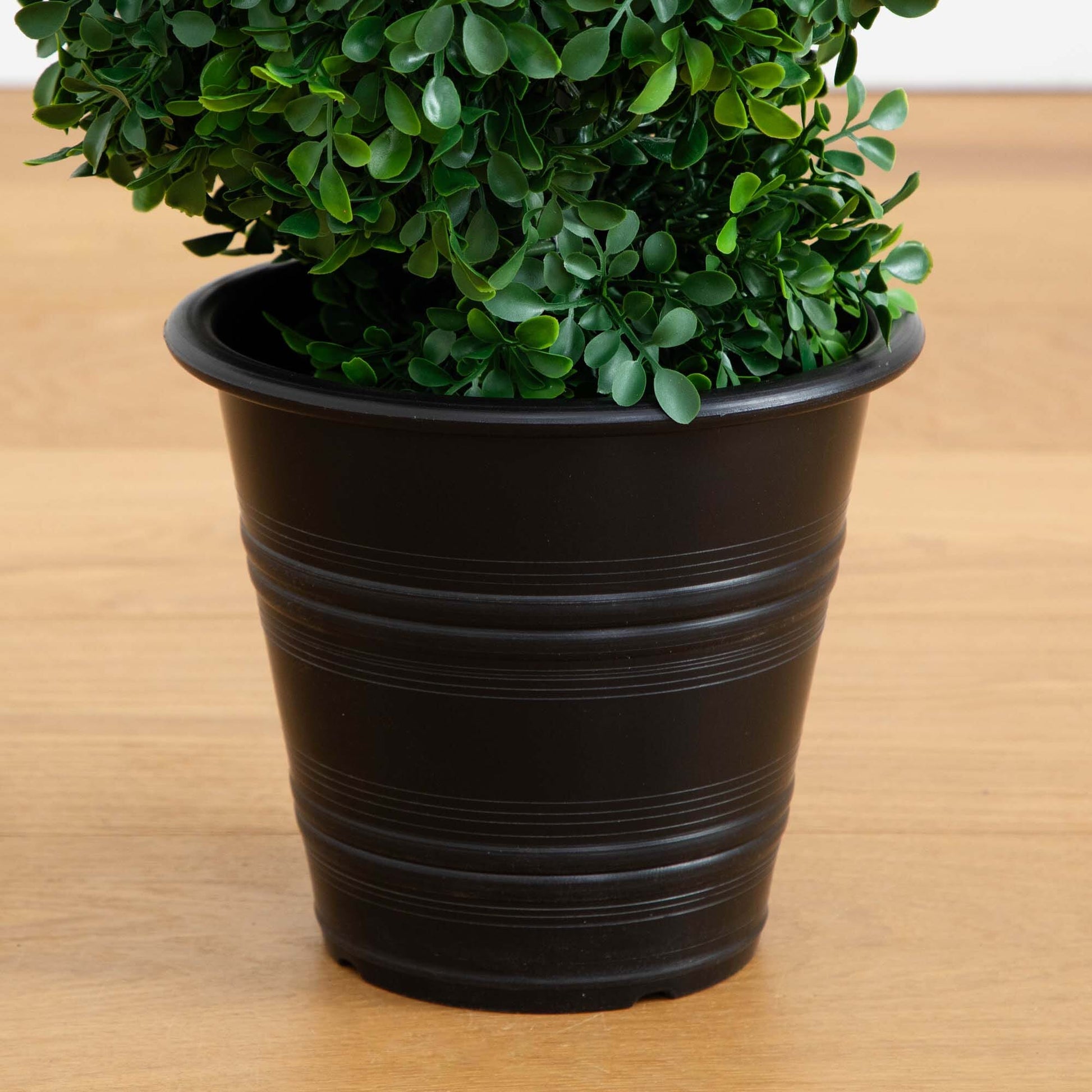 4' Boxwood Spiral Topiary in black planter, Nearly Natural artificial indoor/outdoor plant on Tampa Home & Garden Store