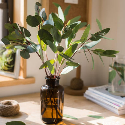 Artificial Faux Eucalyptus Leaves in Various Shapes in amber glass bottle by RusticReach on Tampa Home & Garden Store