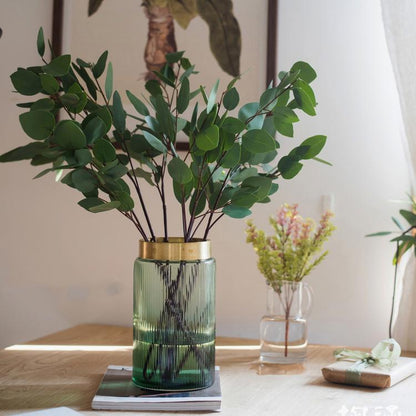 Artificial Faux Eucalyptus Leaves in ribbed emerald glass vase with brass rim by RusticReach on Tampa Home & Garden Store
