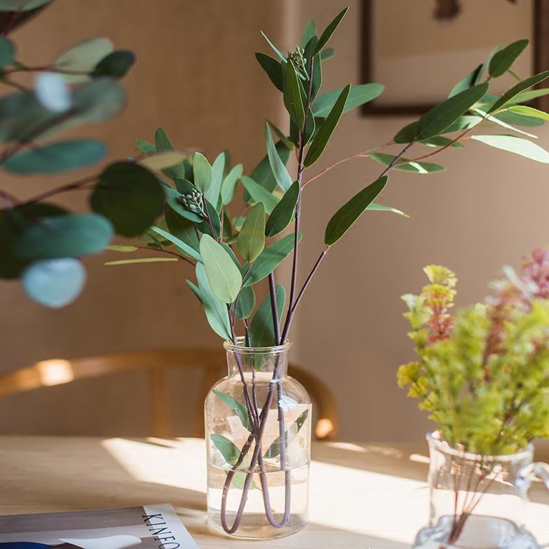 Artificial Faux Eucalyptus leaves in glass jar with green stems and varied shapes RusticReach on Tampa Home & Garden Store