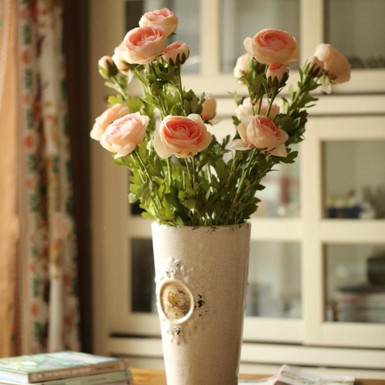 Artificial Buttercup flower stem, peach pink blooms on a tall 28in stem in a beige vase on Tampa Home & Garden Store