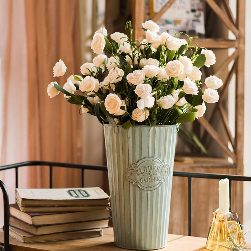 Artificial camellia bloom stem set in white, RusticReach, 16-inch tall, in a planter on Tampa Home & Garden Store