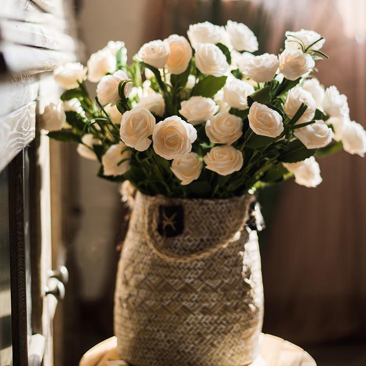 Artificial white camellia bloom stem set, RusticReach, 16 in tall, in a woven bag vase on Tampa Home & Garden Store