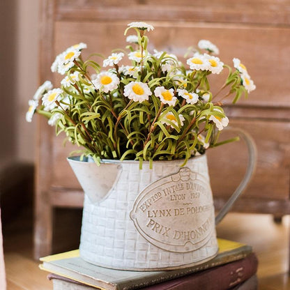 RusticReach faux silk white daisy stem set, 15in tall, in a textured metal watering can planter on Tampa Home & Garden Store