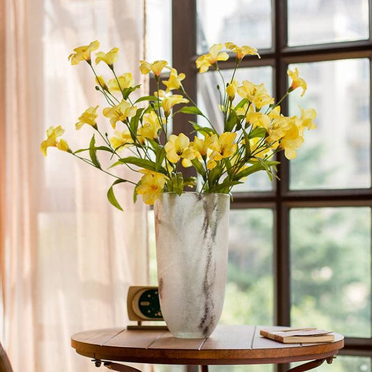 Artificial silk Tung flower stem in yellow with green leaves in a gray marble vase RusticReach on Tampa Home & Garden Store