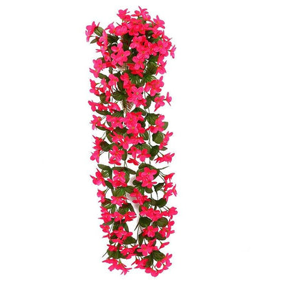 Artificial wisteria hanging garland with pink blossoms for wall or garden decor on Tampa Home & Garden Store