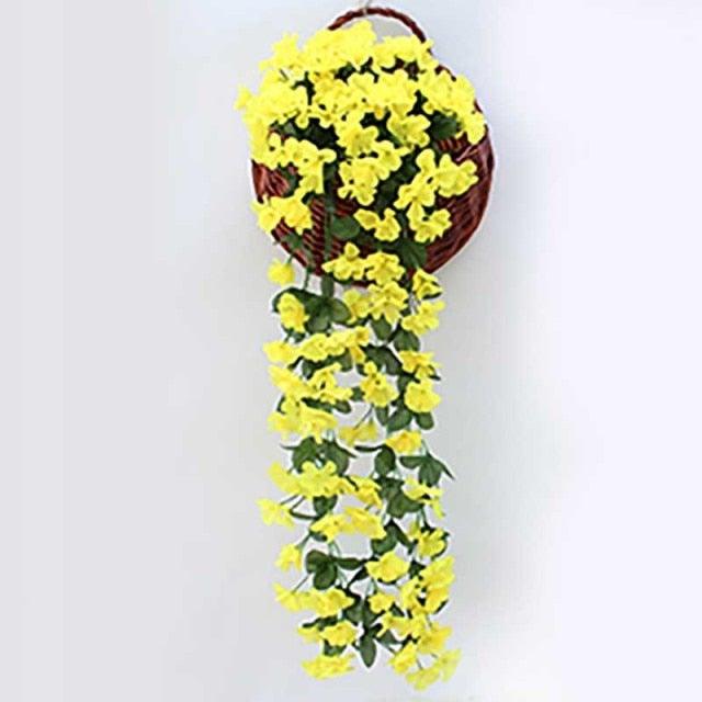Artificial Wisteria hanging basket with yellow blooms and green vines for wall decor on Tampa Home & Garden Store