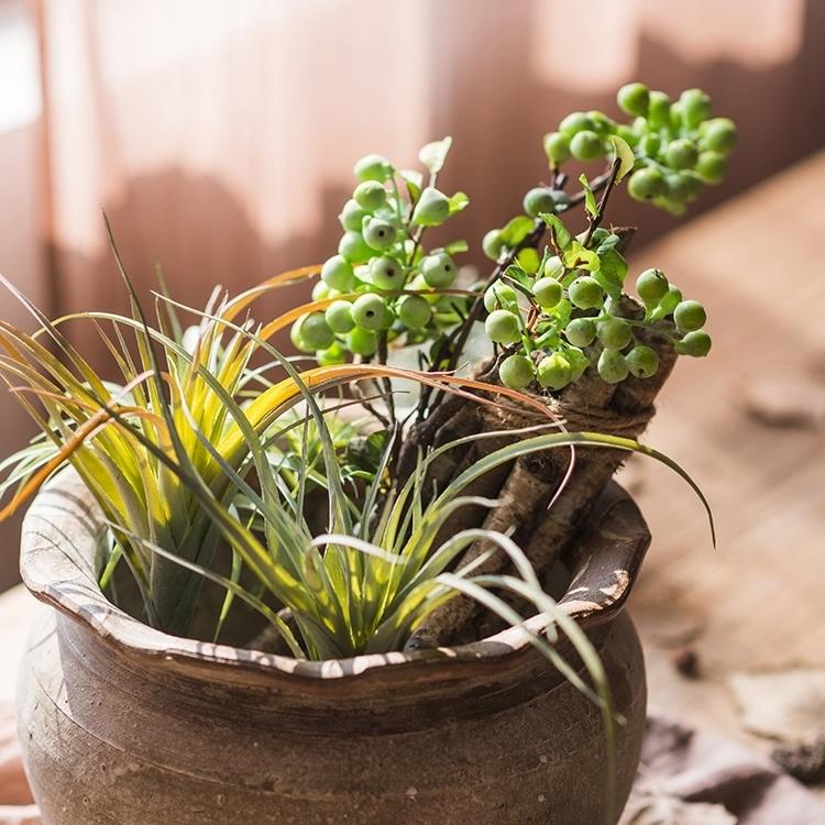 RusticReach artificial berry stem in green, 17" tall, with berry clusters in a rustic pot on Tampa Home & Garden Store