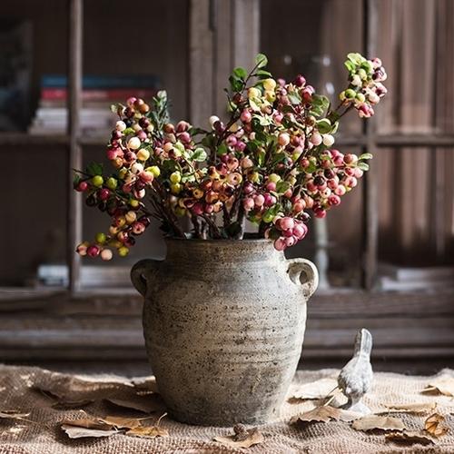 Artificial berry stem by RusticReach, yellow and red, 17" tall, in a rustic ceramic vase on Tampa Home & Garden Store