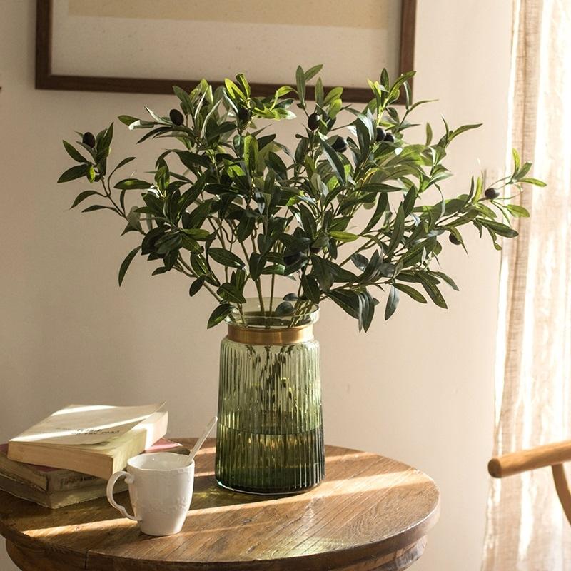Artificial Olive Stem 28in tall with leaves in a ribbed green glass vase by RusticReach on Tampa Home & Garden Store