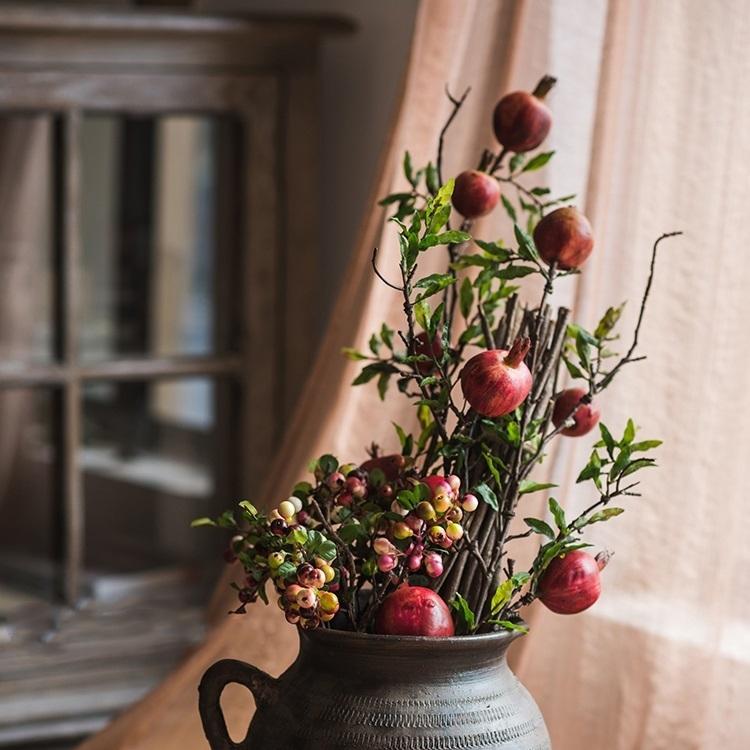 Artificial pomegranate stem with red fruits in a dark ceramic vase RusticReach 36in tall on Tampa Home & Garden Store