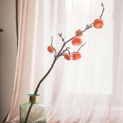 Artificial persimmon fruit stem 43in tall with orange fruits on a branch in a green glass vase on Tampa Home & Garden Store