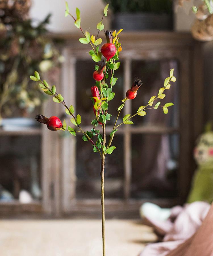 Artificial pomegranate stem with red fruit and green leaves, 23 inches tall on brown stem on Tampa Home & Garden Store