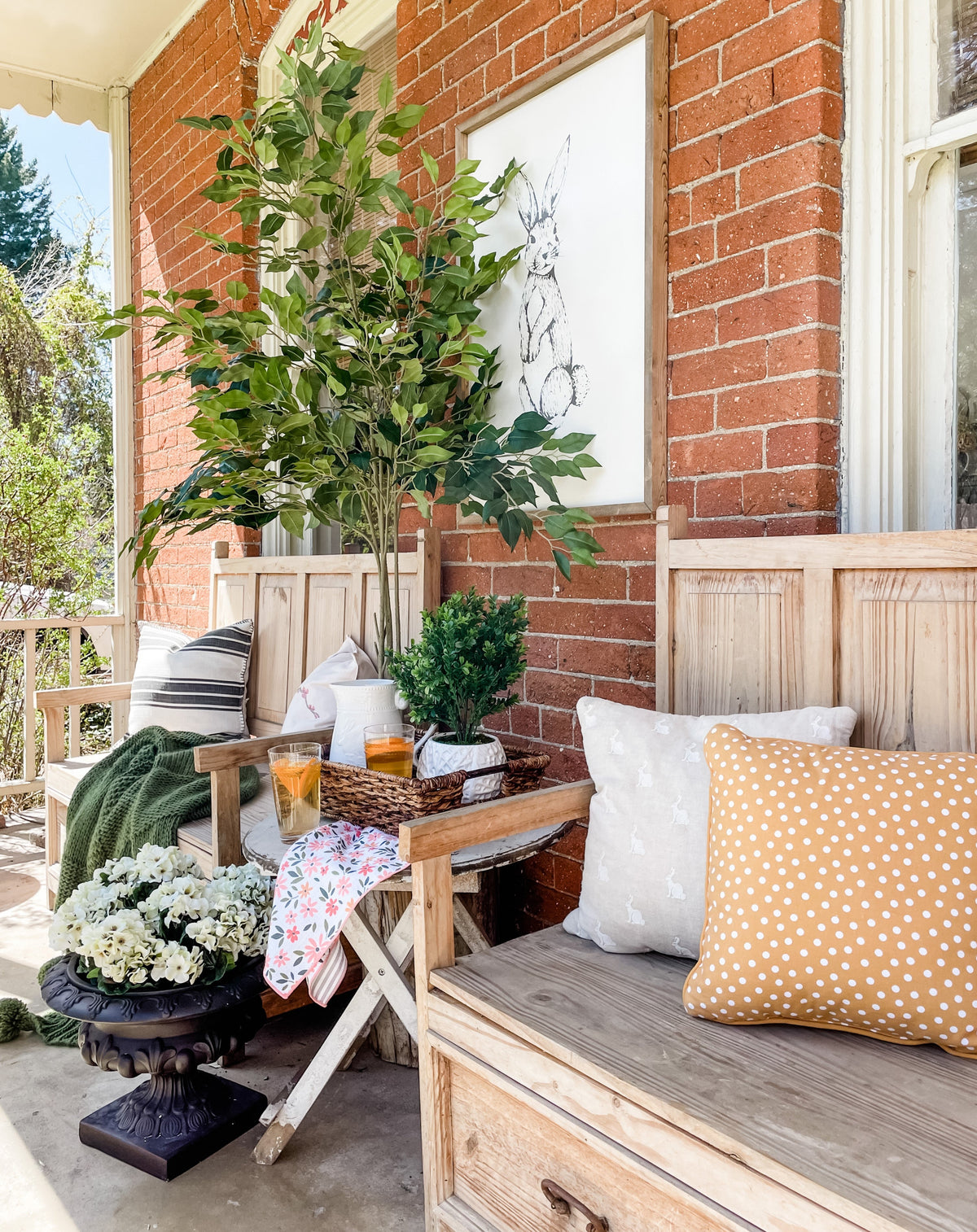 Nearly Natural iron finished decorative urn with lush greenery display on brick porch on Tampa Home & Garden Store