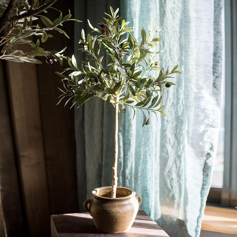 Artificial Silk Faux Olive Tree In Pot in rustic clay planter with green foliage on Tampa Home & Garden Store