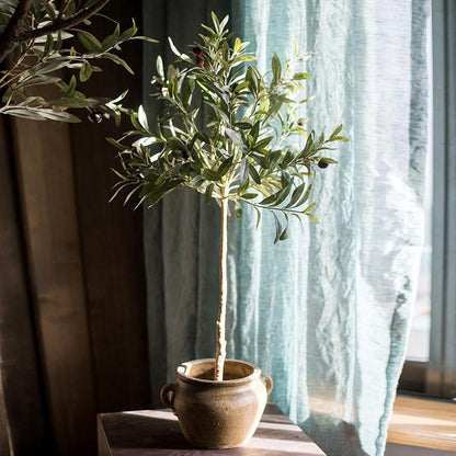 Artificial Silk Faux Olive Tree In Pot in rustic clay planter with green foliage on Tampa Home & Garden Store