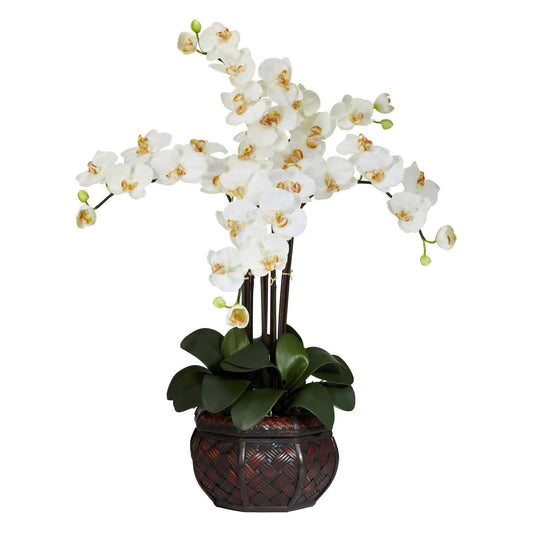 Phalaenopsis silk orchid arrangement with white blossoms in a dark woven vase and green leaves on Tampa Home & Garden Store