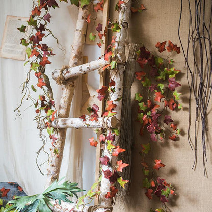 RusticReach artificial ivy vine 43in autumn colors draped over birch ladder on Tampa Home & Garden Store