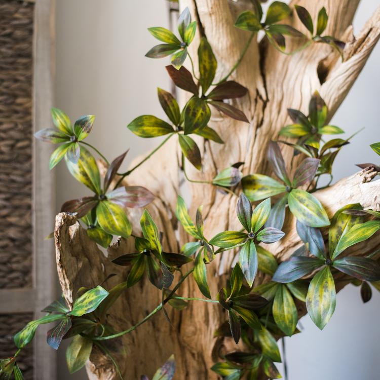 Artificial plant vine with brown and green variegated leaves on a wood trunk 69 inches long on Tampa Home & Garden Store